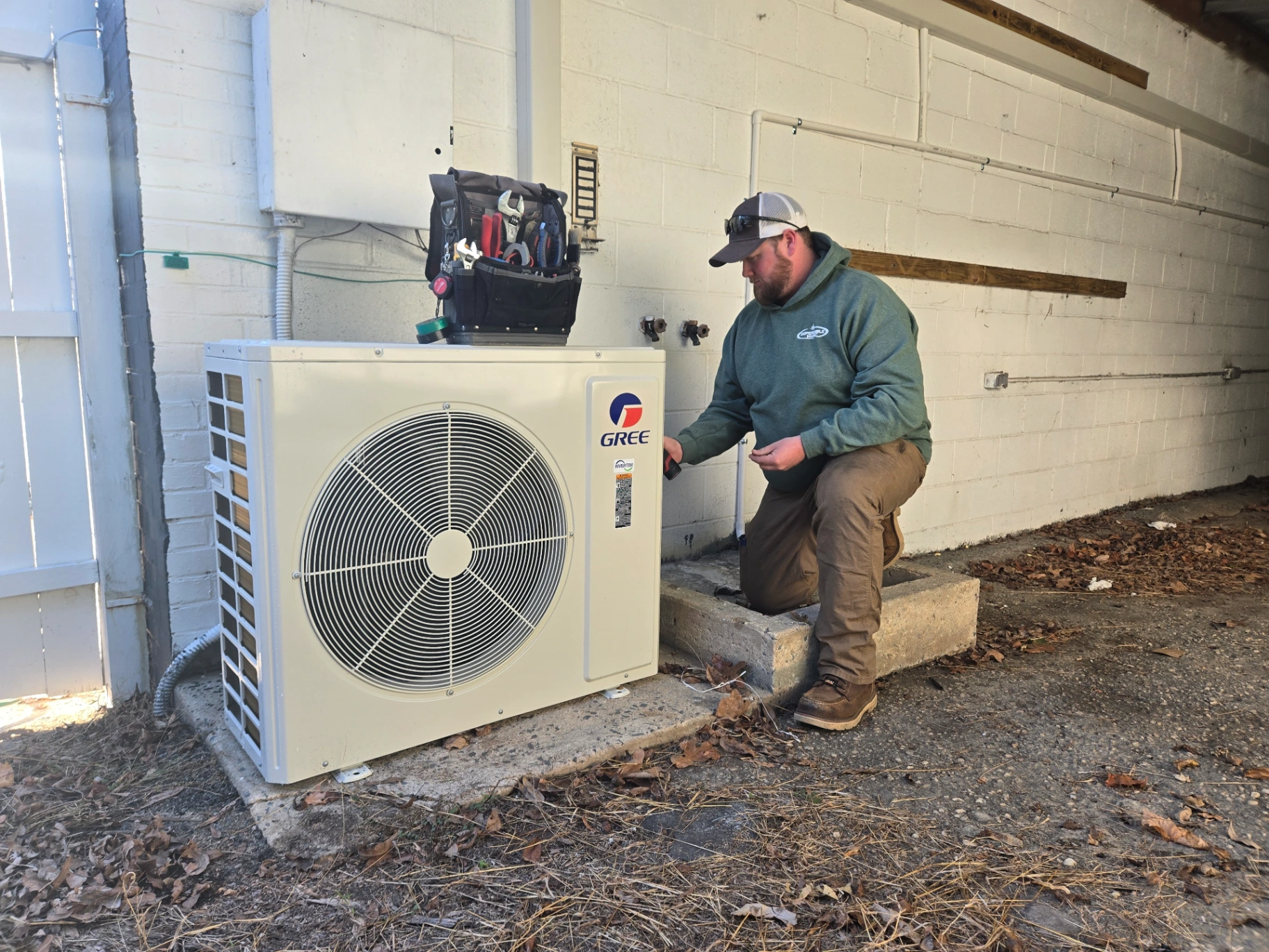 Dependable HVAC technician servicing GREE mini-split in Wadeville